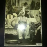 Dilawar Khanji, the Son of Nawab of Junagadh. Sitting on Gold Throne